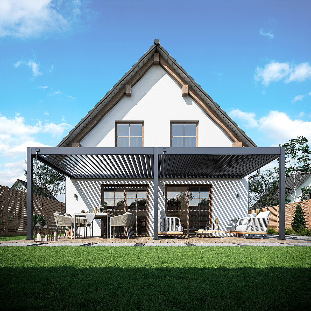 Pergola tarasowa DELUXE WALL 3.6x7,2 w kolorze antracytowym zamontowana, przed białym domem.