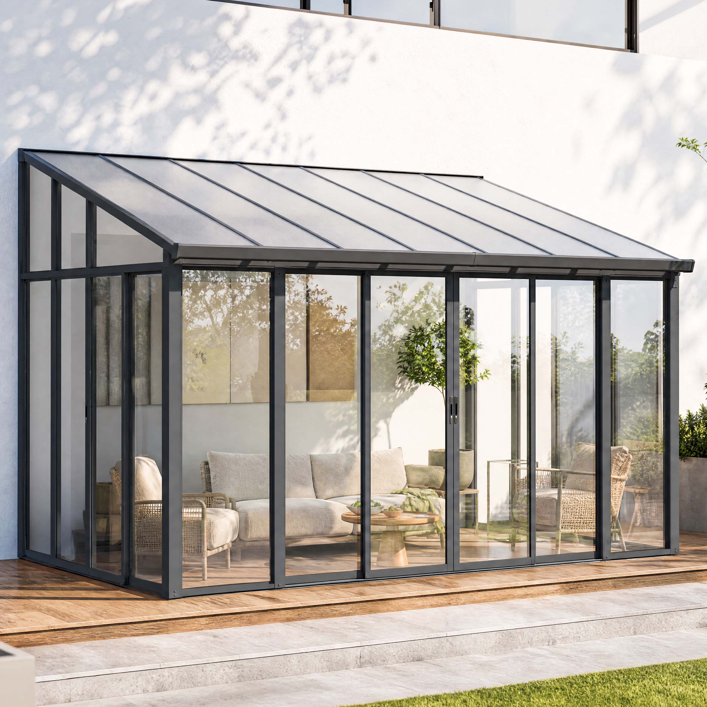 Ogród zimowy ASTON 431x305 cm Cold Grey przy ścianie budynku
